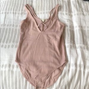 Light pink strappy bodysuit